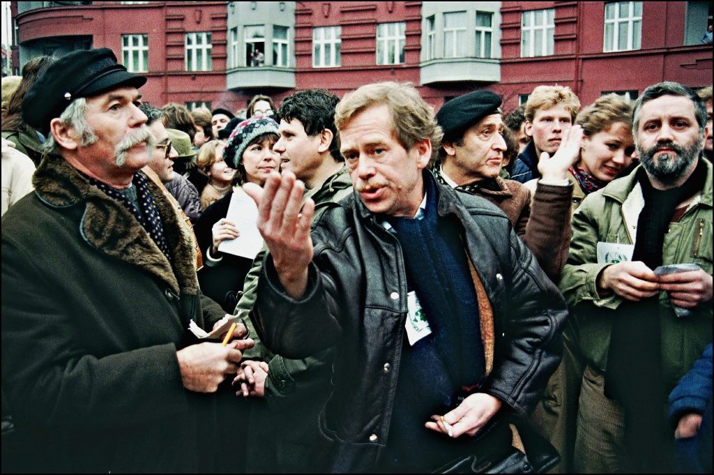 Vaclav Havel (center) walks with Charter 77 members Ladislav Lis (Left) and Rudolf Batek (2nd right) while leading marches during the Velvet Revolution
