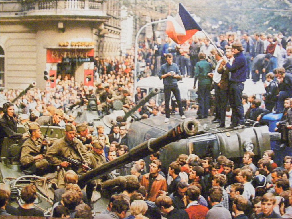 Czechs block a unit of Soviet soldiers from moving further into the city during the Prague Spring (1989).