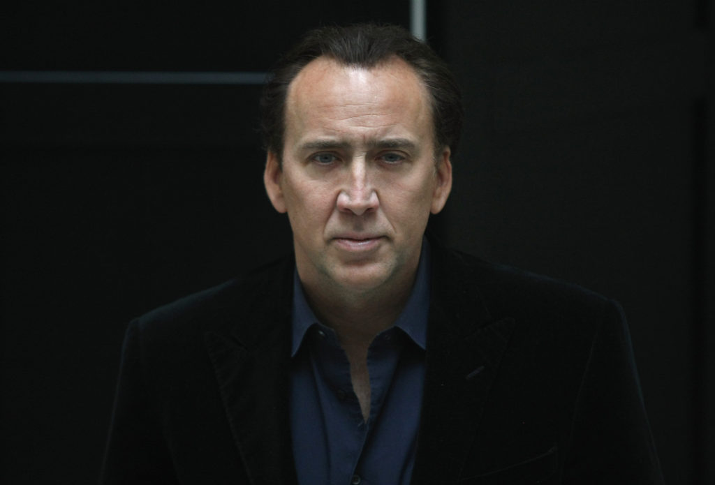 BERLIN, GERMANY - JANUARY 23: Actor Nicolas Cage poses at a photocall at the Hotel De Rome on January 23, 2012 in Berlin, Germany. Cage was in Berlin to promote his 3-D fantasy/adventure film 'Ghost Rider - Spirit of Vengeance,' based on a comic book, in which he returns as the antihero Johnny Blaze, also known as Ghost Rider, a bounty hunter for the devil. The film will appear in German cinemas on February 23. (Photo by Adam Berry/Getty Images)
